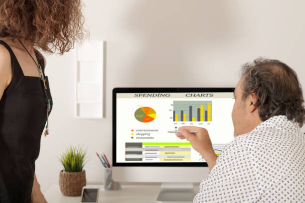 istock woman and man working at office 984932392