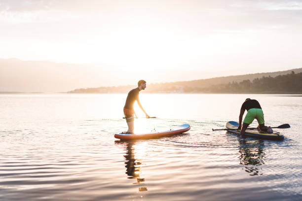 istock Stand up paddle boarding on quiet sea 984941030