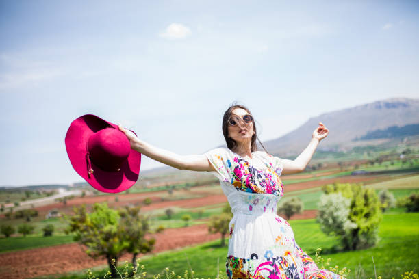 istock a young woman in the spring 984944678