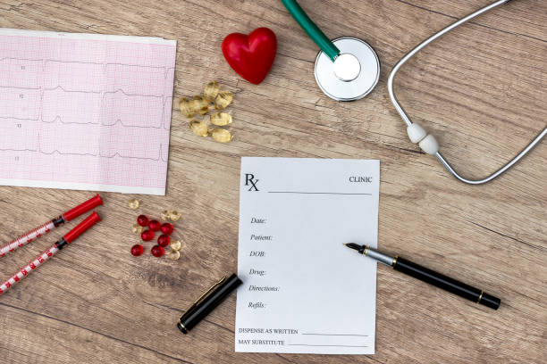 istock medical concept - Pharmacy receipt, stethoscope, heart and syringe 984949072