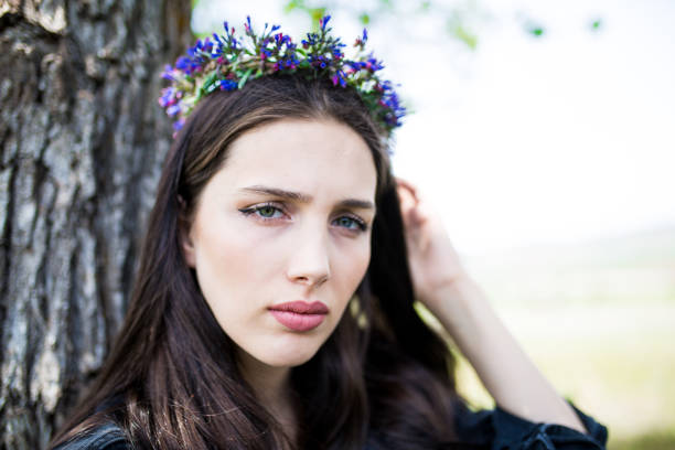 female model photography between flowers