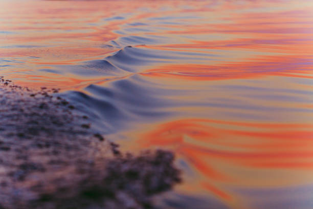 istock Colorful shimmering water waves in the sunlight 984951578