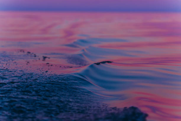 istock Colorful shimmering water waves in the sunlight 984953016