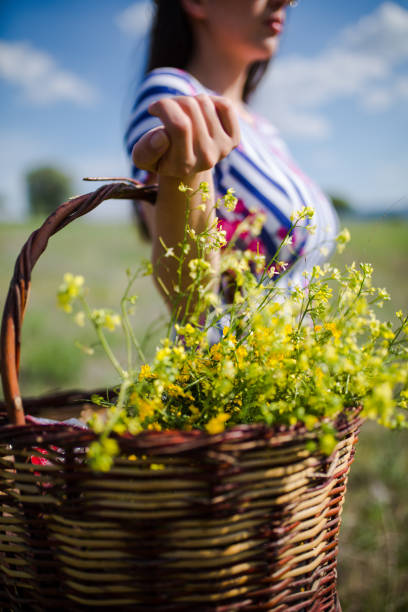 istock a young woman in the spring 984961650