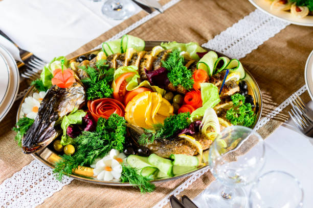 istock Serving food in the restaurant. Appetizing cooked stuffed pike w 984966540