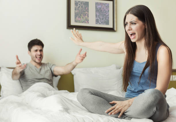 istock Husband and wife arguing with each other 984978236