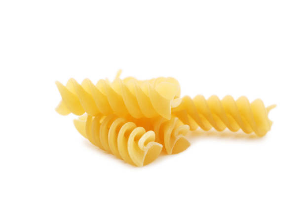 istock Spiral pasta isolated on a white background 984988608