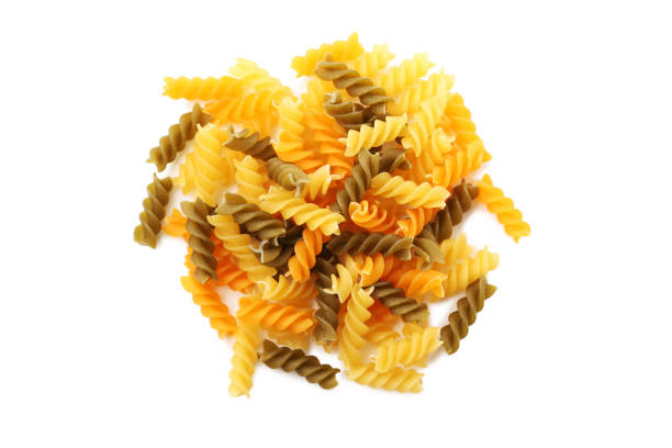 istock Spiral pasta isolated on a white background 984989860