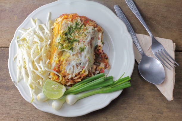 istock Fried noodle Thai style with egg is delicious 984994138