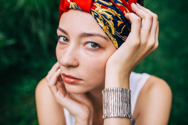 istock Beautiful woman with colored turban 985003088