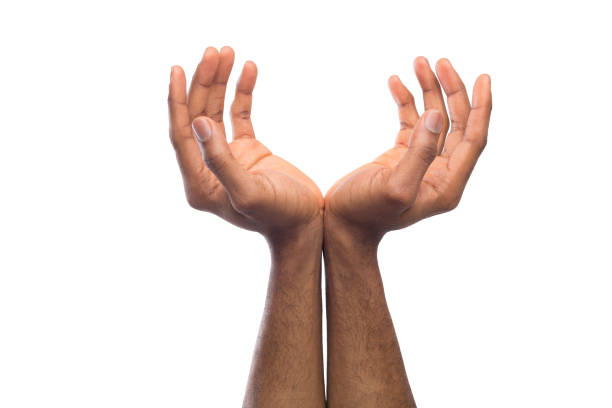 istock Black male hands cupped at white isolated background 985007130