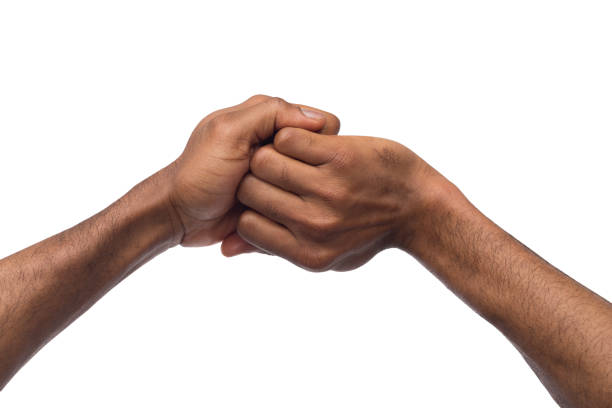 istock Hand mudras - black male hands making Ganesha position, isolated 985007666