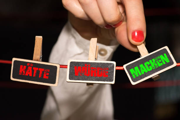 A woman motivates with signs Would have, dignity, make to act