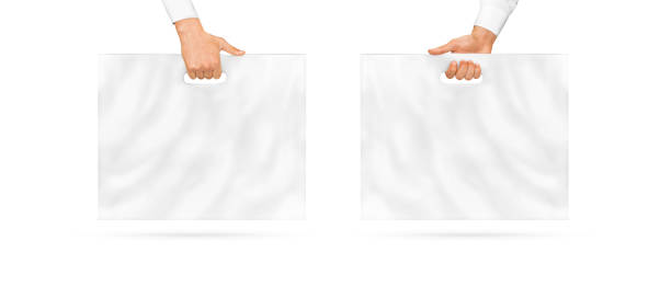 istock Blank large plastic bag mock up holding in hand 985019968