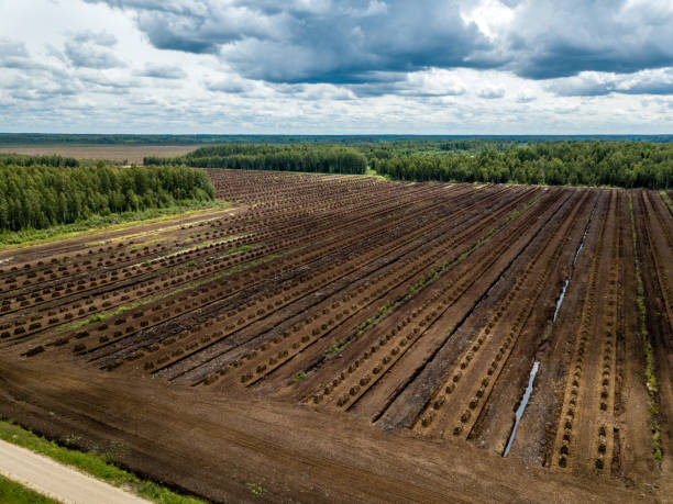 istock drone image. aerial view of rural area with fields of turf development 985025382