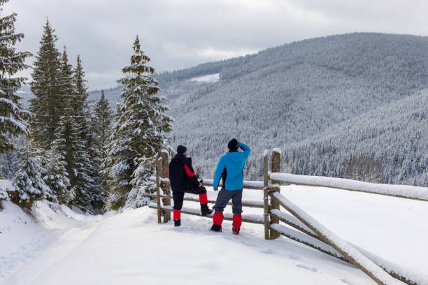 istock Two men in the Carpathians in winter 985038306