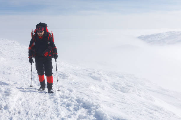 istock A hiker in the winter mountains 985038600