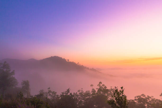 istock scenery sunrise above the mist 985042246