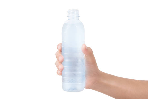 istock hand hold water bottle on white background 985043496