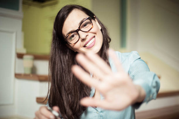 istock Beauty - female blowing on painted fingernails 985047502