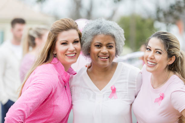 istock Girlfriends enjoy time together at charity event 985048384
