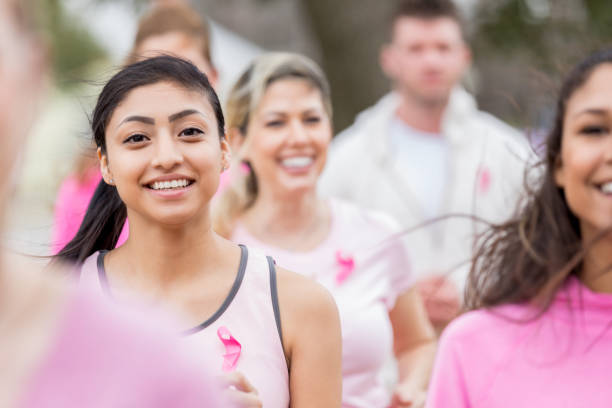 istock People running during braest cancer awareness race 985050448