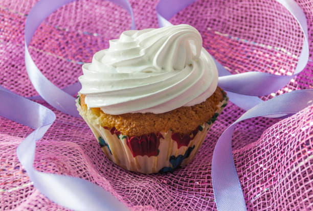 istock Tasty muffin cake with protein cream 985056898