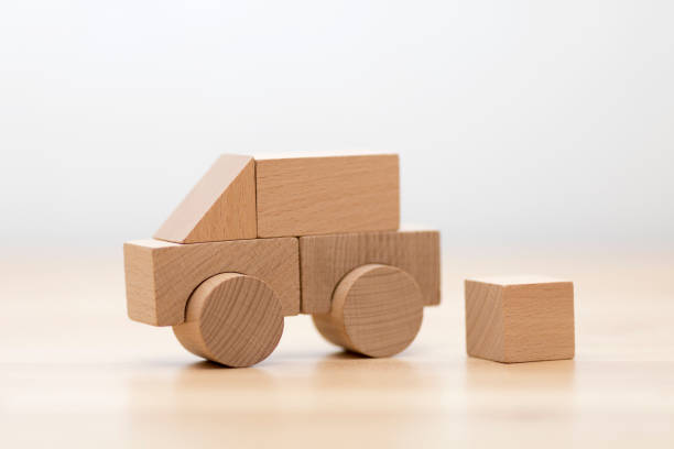 istock Small wooden toy car 985059634