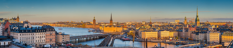 Panoramic view of Stockholm city center with famous Riddarholmen in Gamla Stan in beautiful golden morning light, Sodermalm, central Stockholm, Sweden