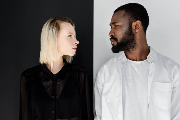 istock side view of multicultural couple looking at each other 985073608