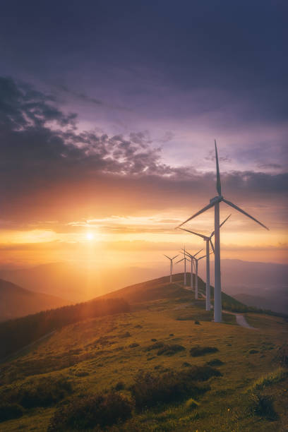 renewable energy with wind turbines stock photo