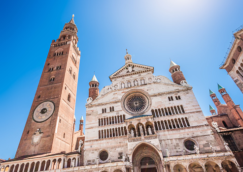 Ancient Cathedral of Cremona with famous Torrazzo bell tower and baptistery in Cremona, Lombardy, Italy