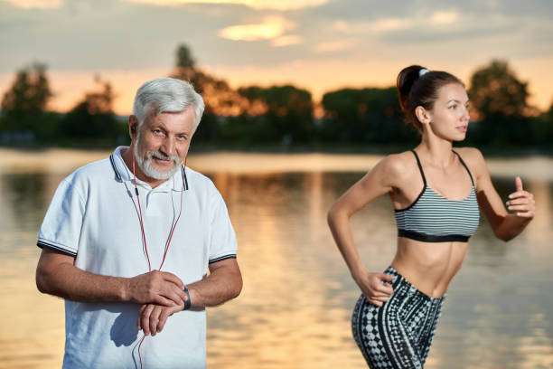 istock Senior man's and young girl's outdoors sport activity. 985078076