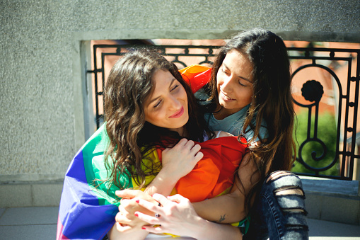 LGBT lesbian couple moments happiness concept