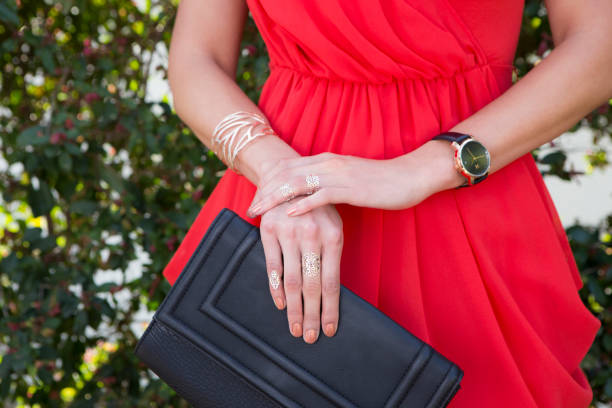 istock Woman Holding Leather Clutch 985091392