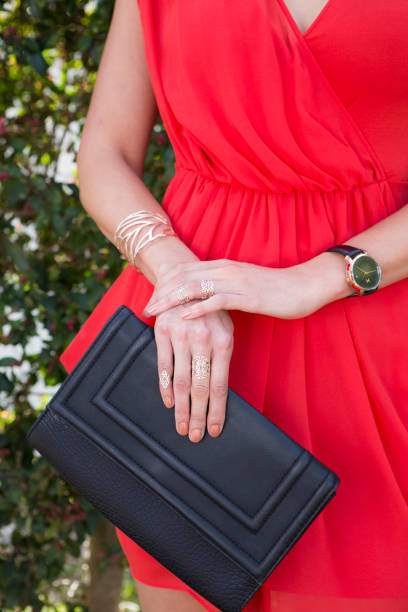 istock Woman Holding Leather Clutch 985091414