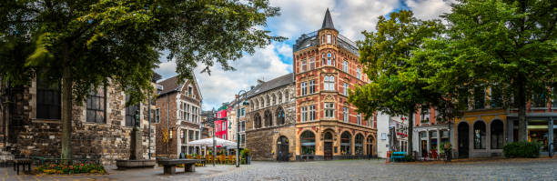 Aachen historic city centre - Panorama Historic town sqaure in the old town of Aachen in Germany. aachen stock pictures, royalty-free photos & images