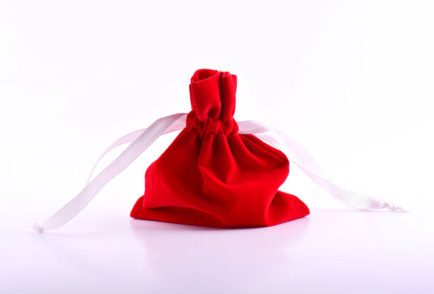istock Red velvet pouch on a white background 985114176