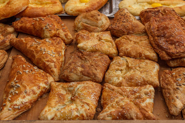istock Rich buns sprinkled with sesame seeds and sunflower. 985115228