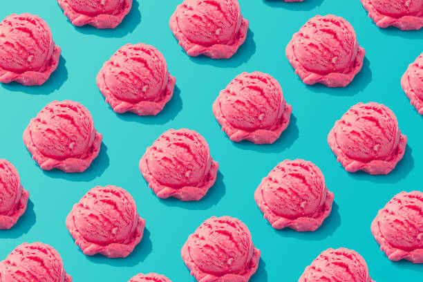 Pink strawberry ice cream pattern on pastel blue background. Summer minimalism. Isometric flat lay. Pink strawberry ice cream pattern on pastel blue background. Summer minimalism. Isometric flat lay. vanilla ice cream photos stock pictures, royalty-free photos & images
