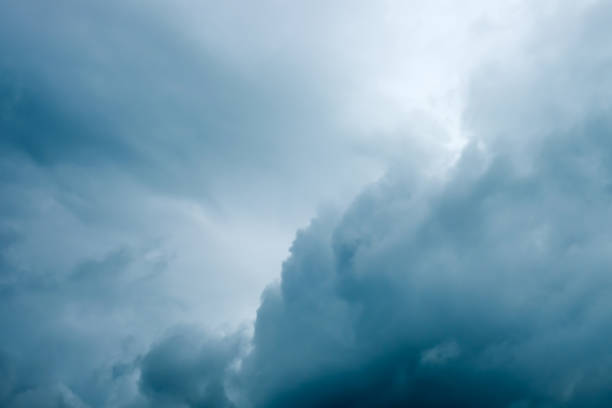 istock Heavy grey clouds in the sky before the rain 985118644