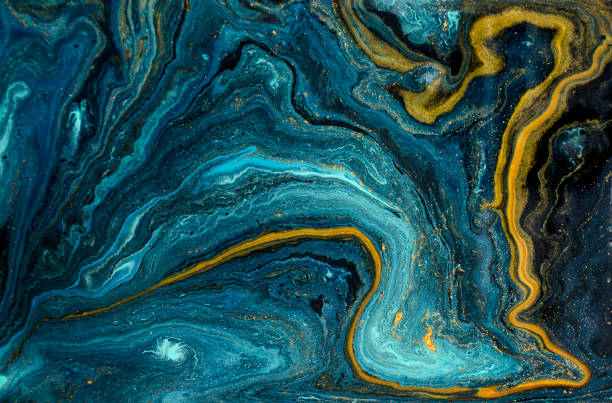 Marble abstract acrylic background. Blue marbling artwork texture. Agate ripple pattern. Gold powder.