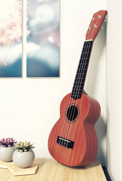 istock Musical Instrument, Ukulele on the Table, Interior Scene 985125926