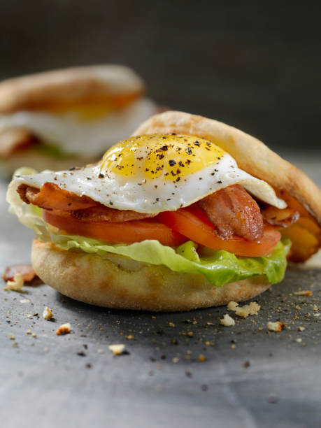 istock Fried Egg, BLT Breakfast Sandwiches on English Muffins 985129344