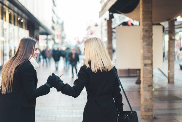 istock Two girls in pedestrian zone 985129372