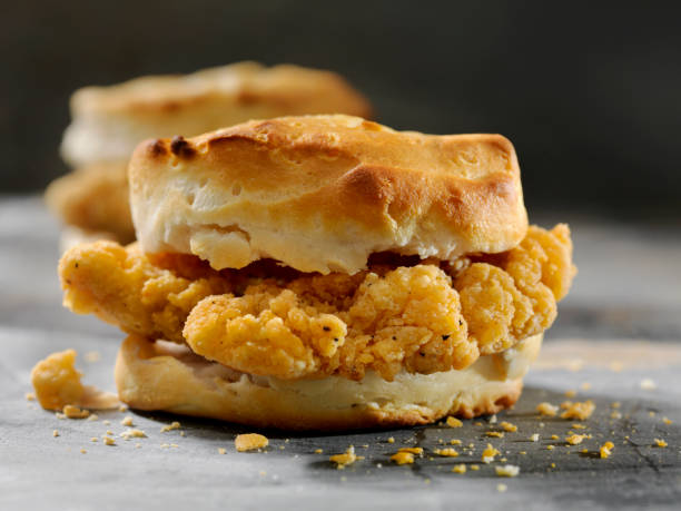 Fried Chicken Sandwich  on a Biscuit Fried Chicken Sandwich  on a Biscuit breakfast sandwhich stock pictures, royalty-free photos & images