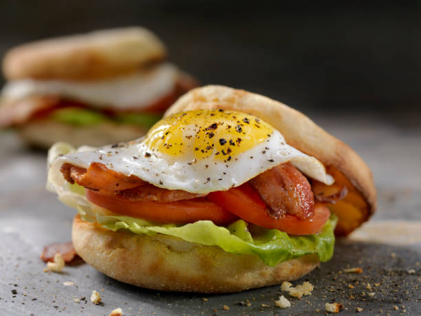 istock Fried Egg, BLT Breakfast Sandwiches on English Muffins 985147734