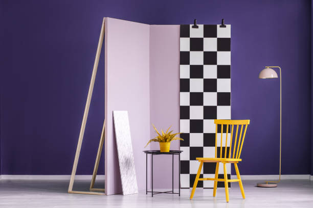 istock Plant in colorful studio interior 985151958