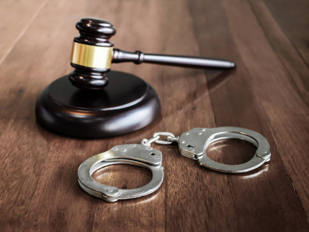 istock handcuffs and judge gavel 985154910