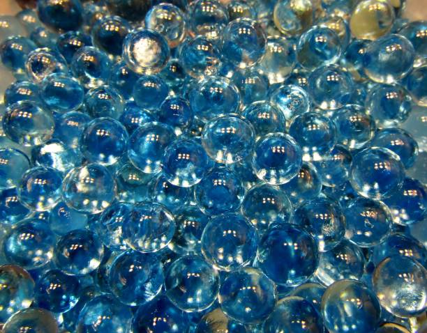 istock Blue aroma oil scented beads background 985166640